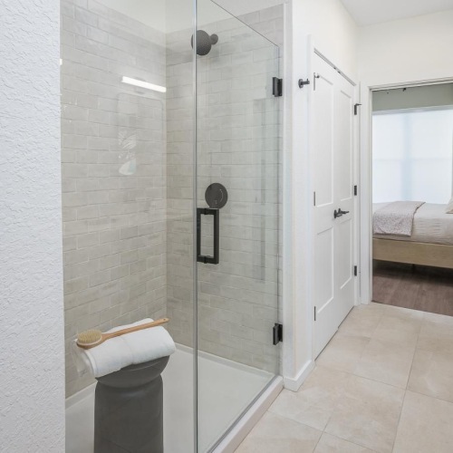 a bathroom with a glass shower