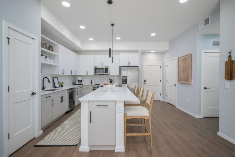 Kitchen with island and white countertops