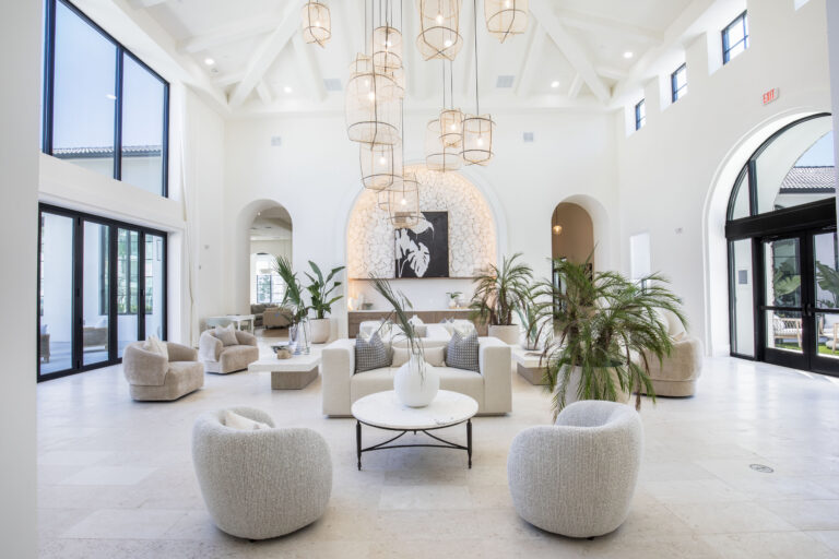 Luxurious sitting area with chandelier at Fiori Apartments