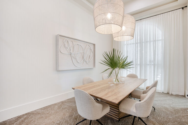 Elegant dining area with pendant lights at Fiori Apartments